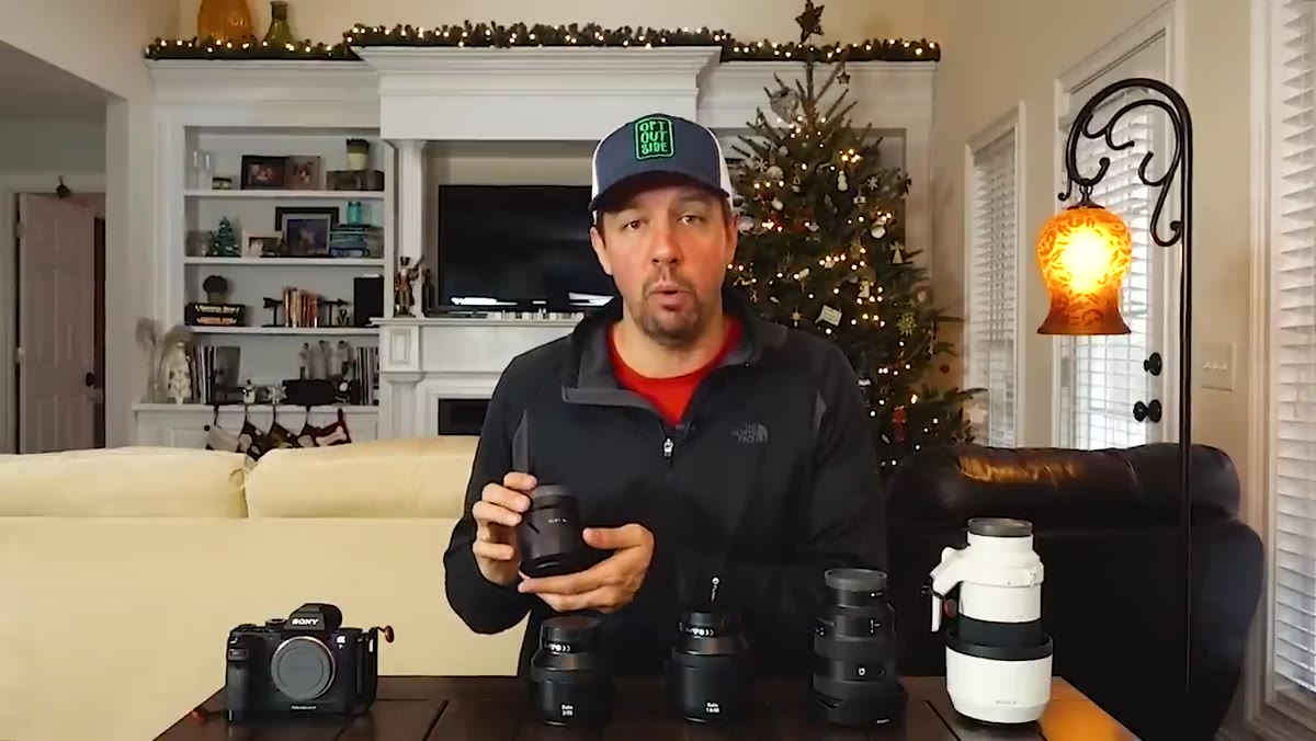 Mark holding the Sony 55mm 1.8 lens