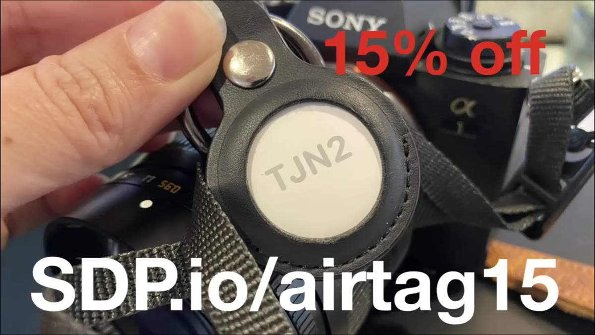 Apple AirTags shown attached to camera gear