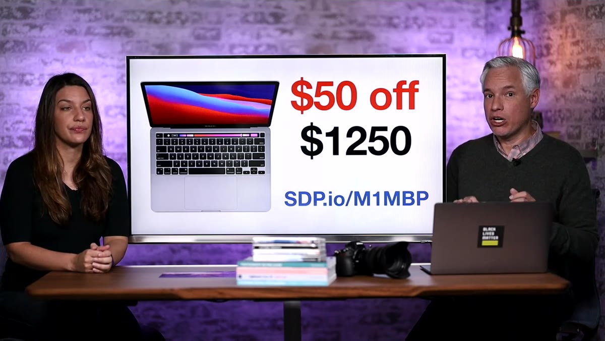 MacBook Pro M1 pricing shown on screen