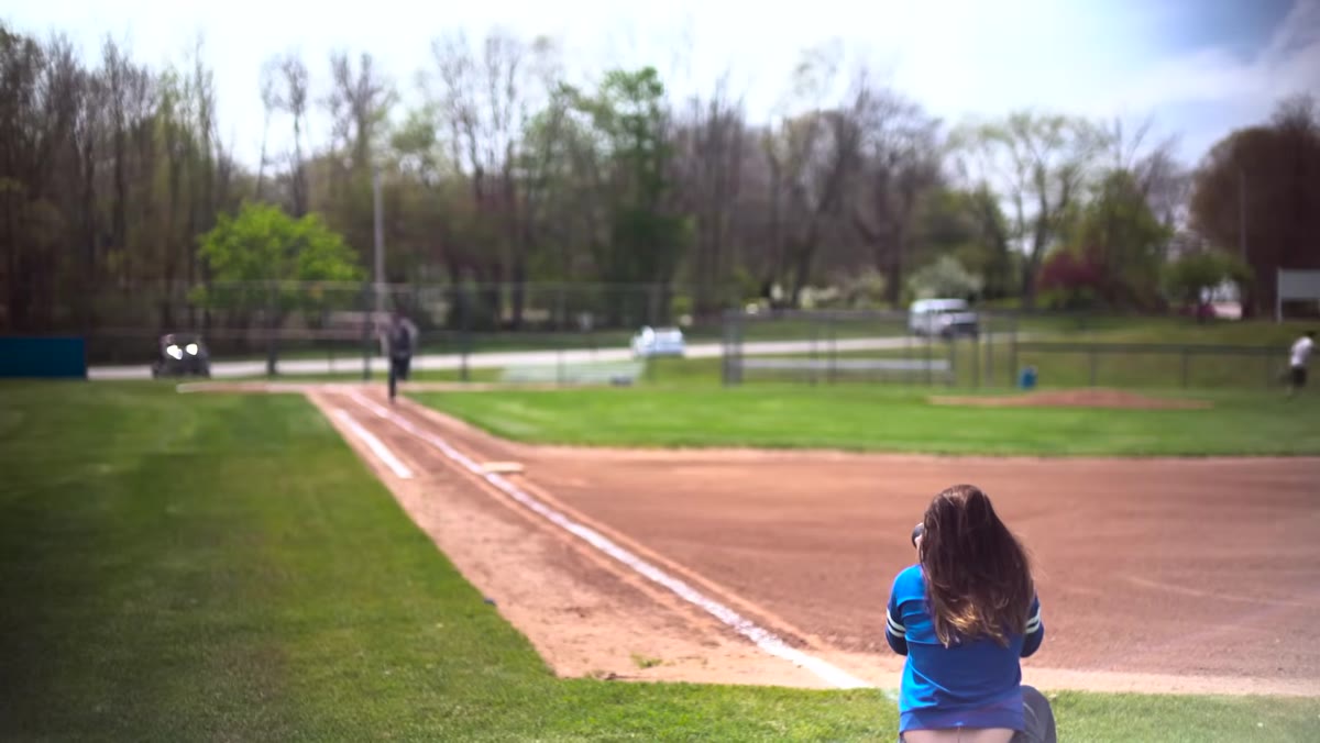 Both cameras tracking a moving subject on a field