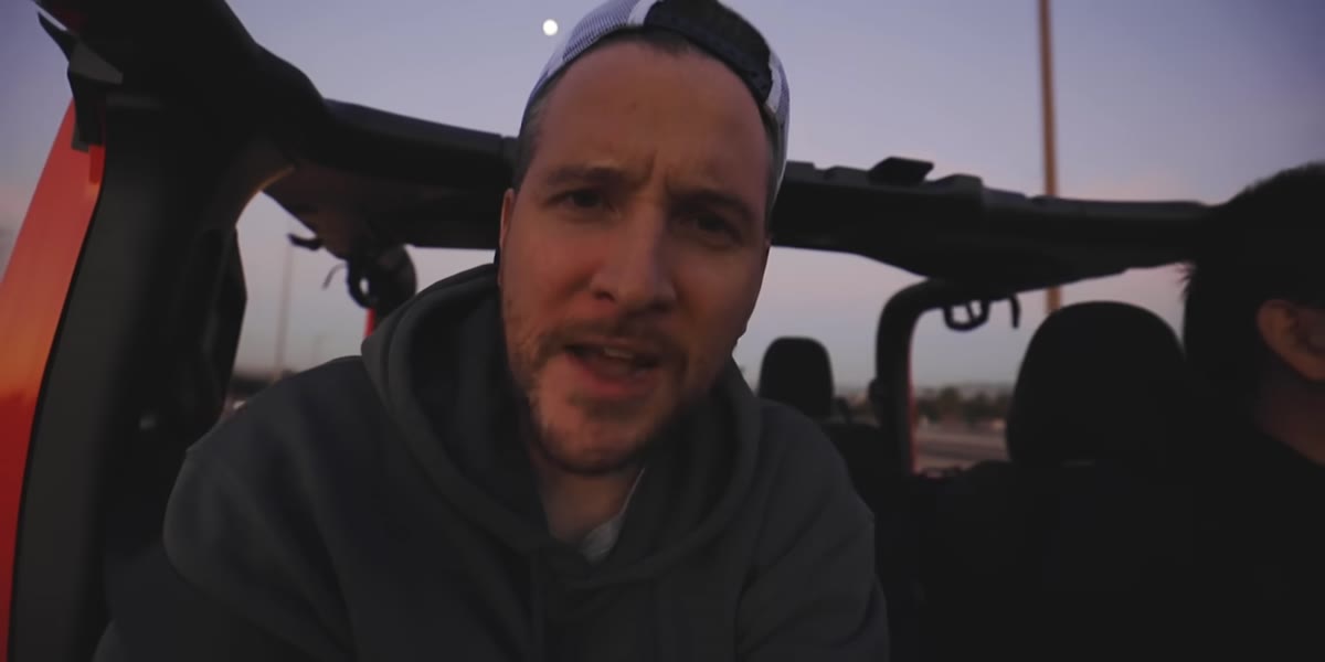 Peter filming handheld from moving Jeep at sunrise