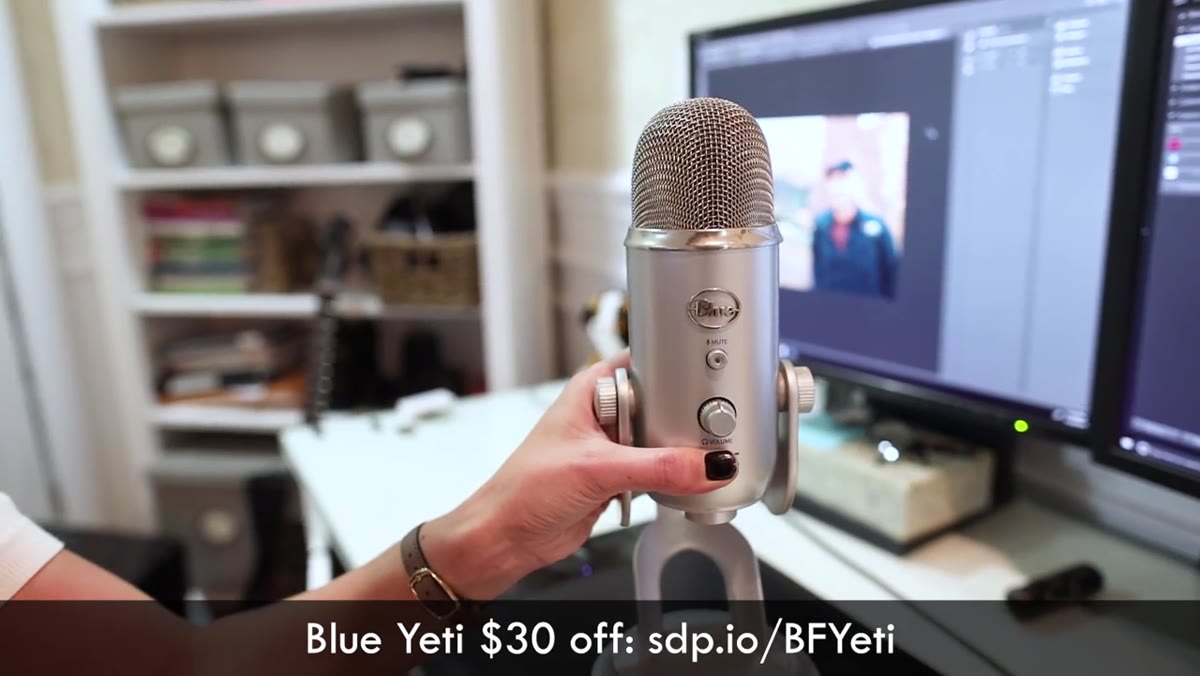 Blue Yeti microphone visible on desk during recording