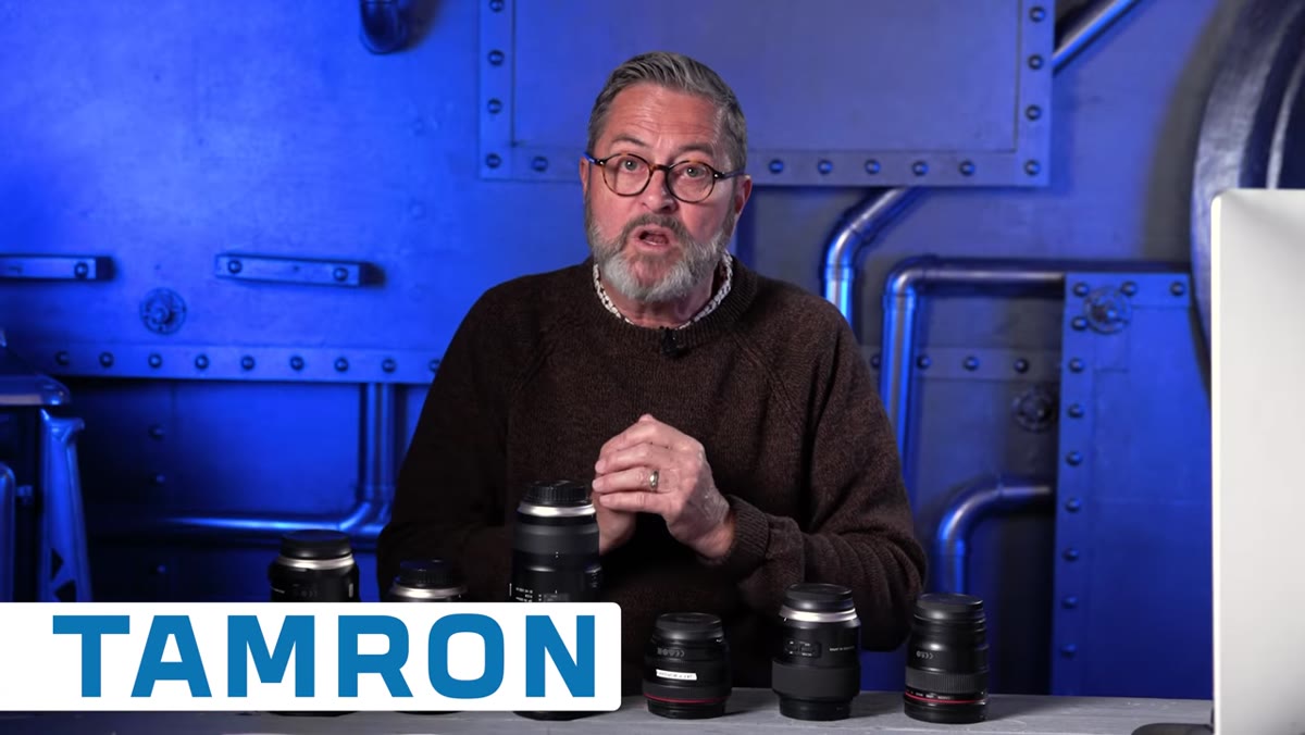 Three zoom lenses laid out showing full trinity kit