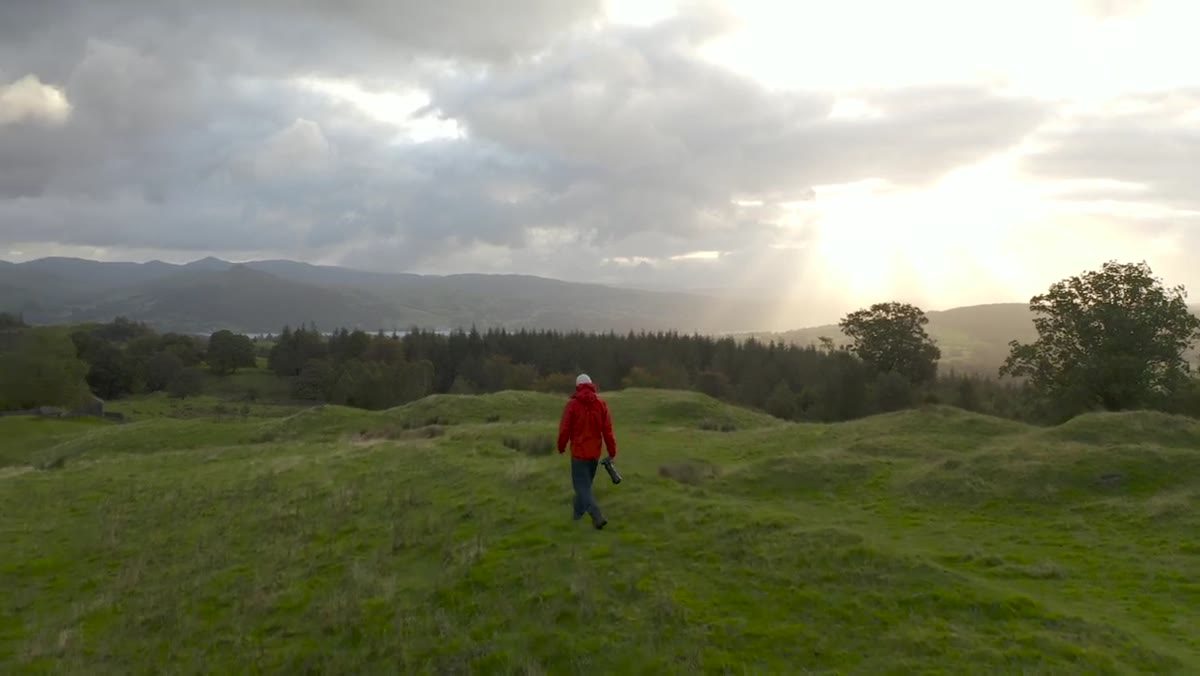 Danson zooming lens while scanning the landscape for composition