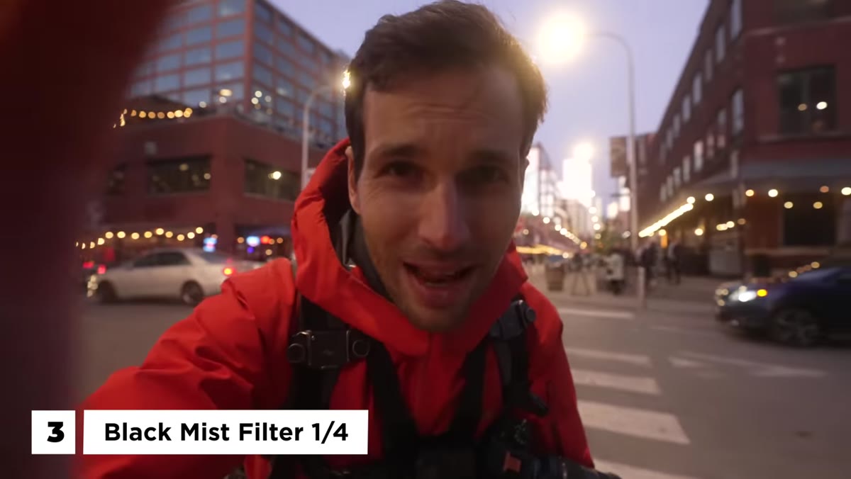 Black mist filter held up and discussed before shooting