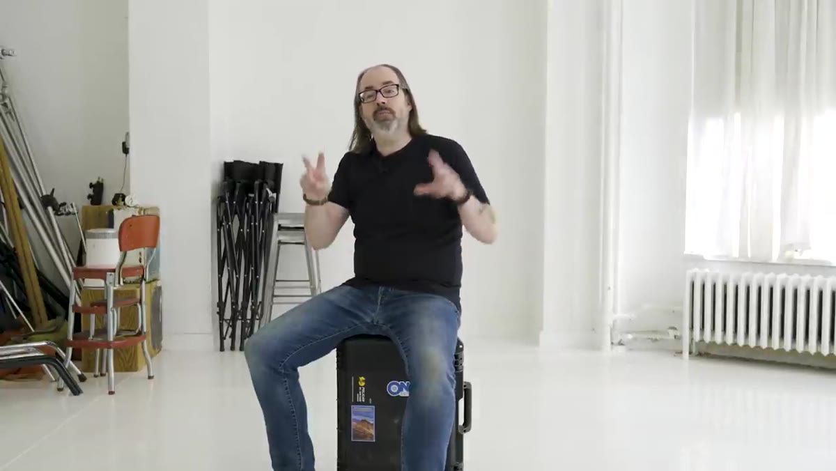 Daniel explaining compression and portrait framing in studio