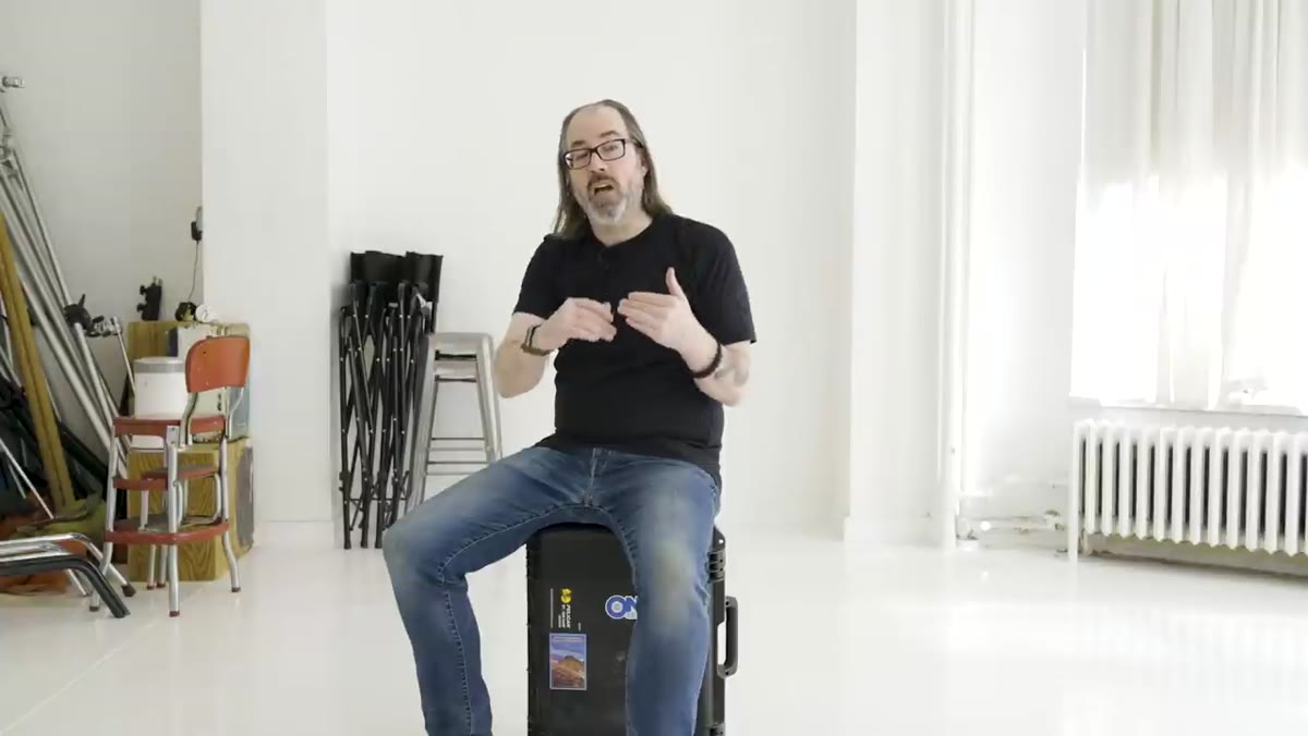 Daniel framing a portrait and noting distance from subject