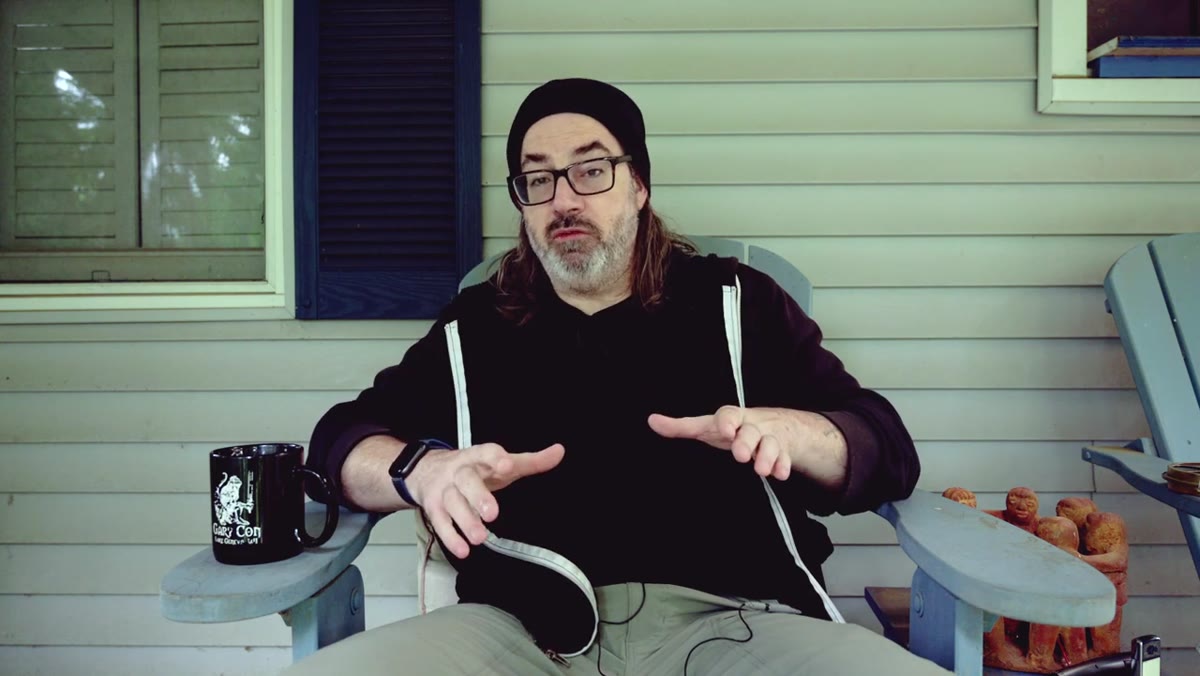 Daniel on porch discussing whether full frame is necessary