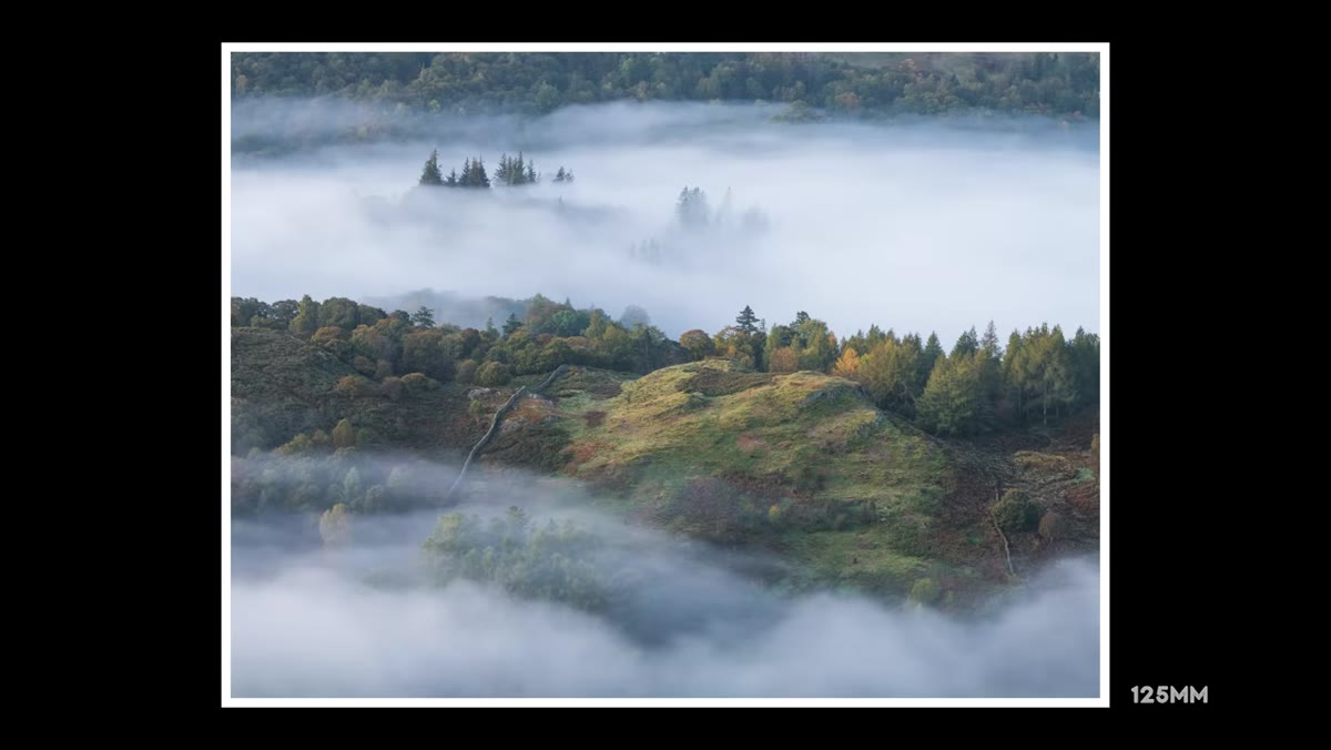 Fog rolling and shifting around white farmhouse in valley below