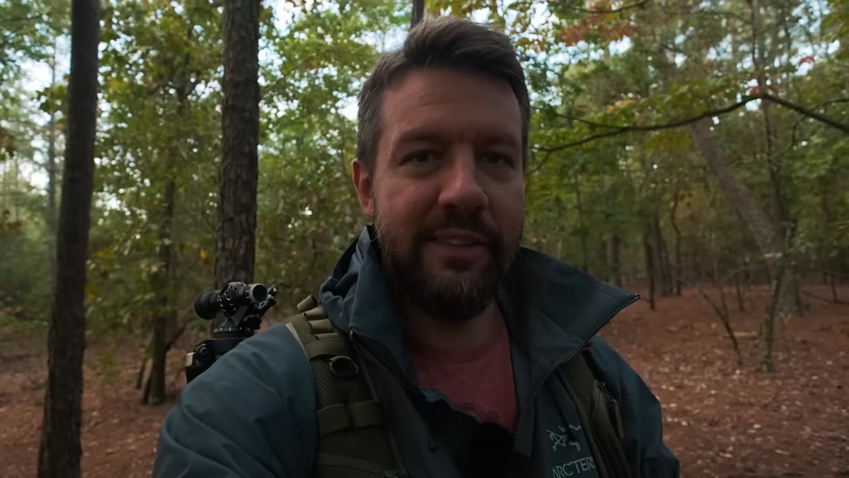 Mark arriving at a local woodland, putting on a long lens