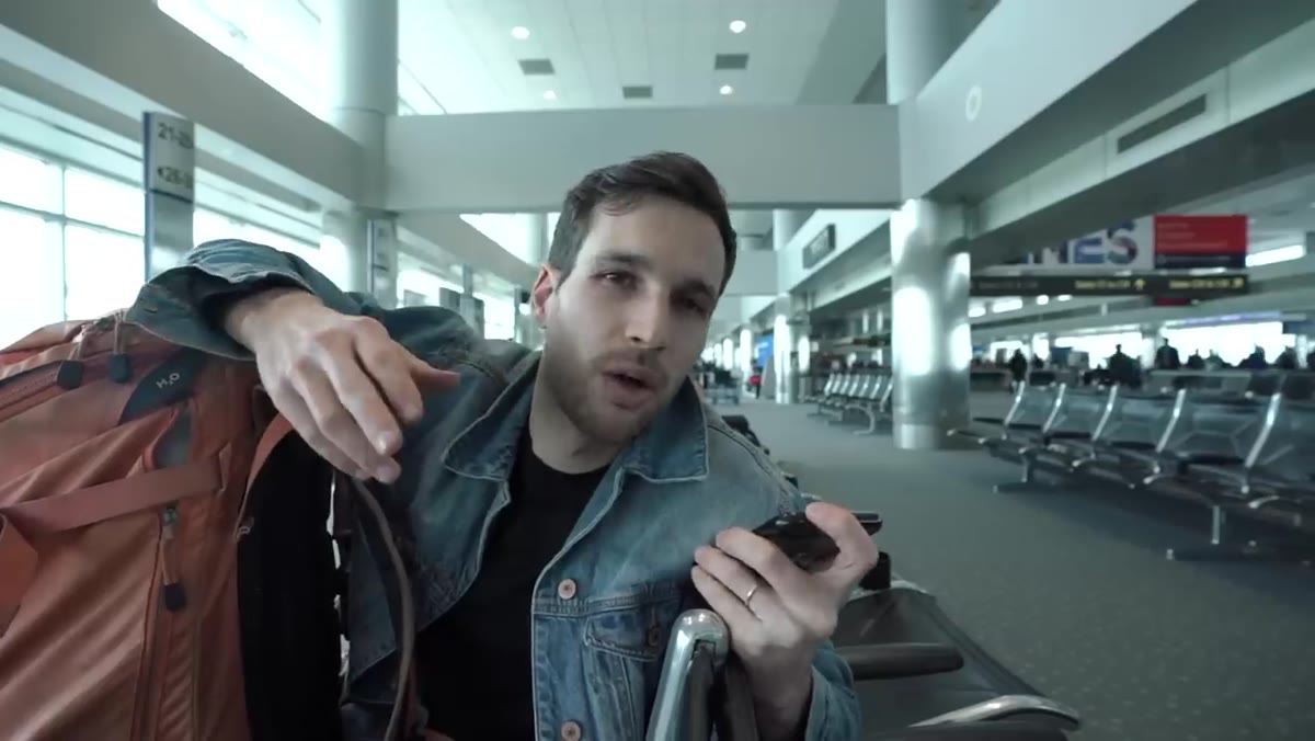 Discussion of charger placement between carry-on and checked luggage