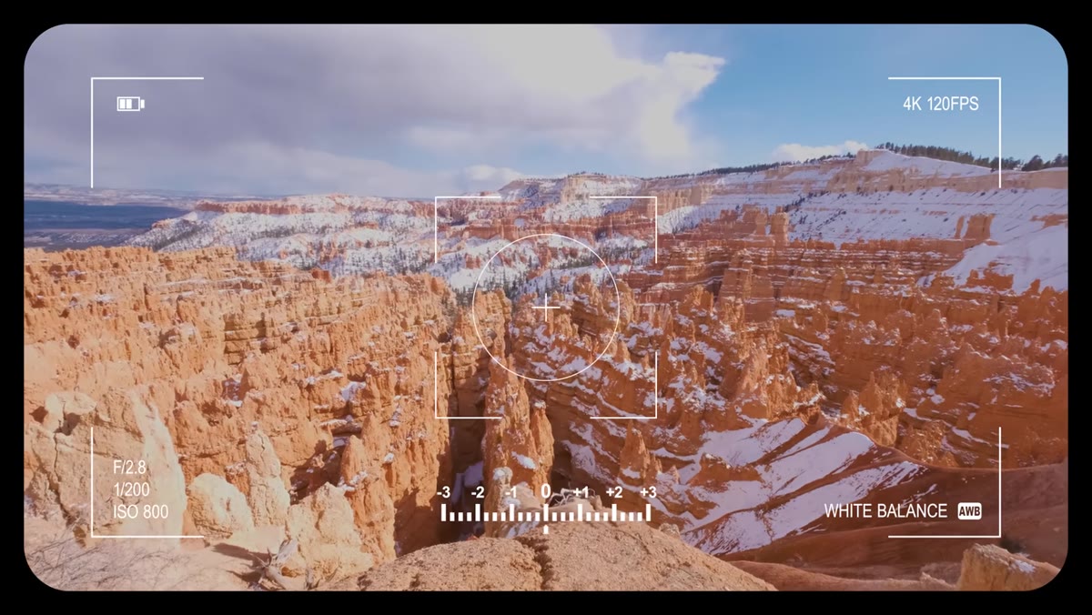 Camera panning slowly across top row of landscape scene