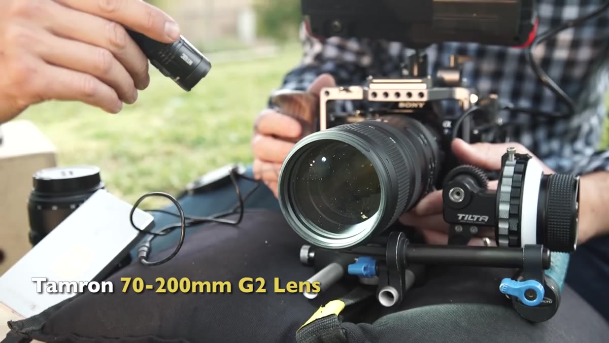 Jay demonstrating flashlight aimed into camera lens