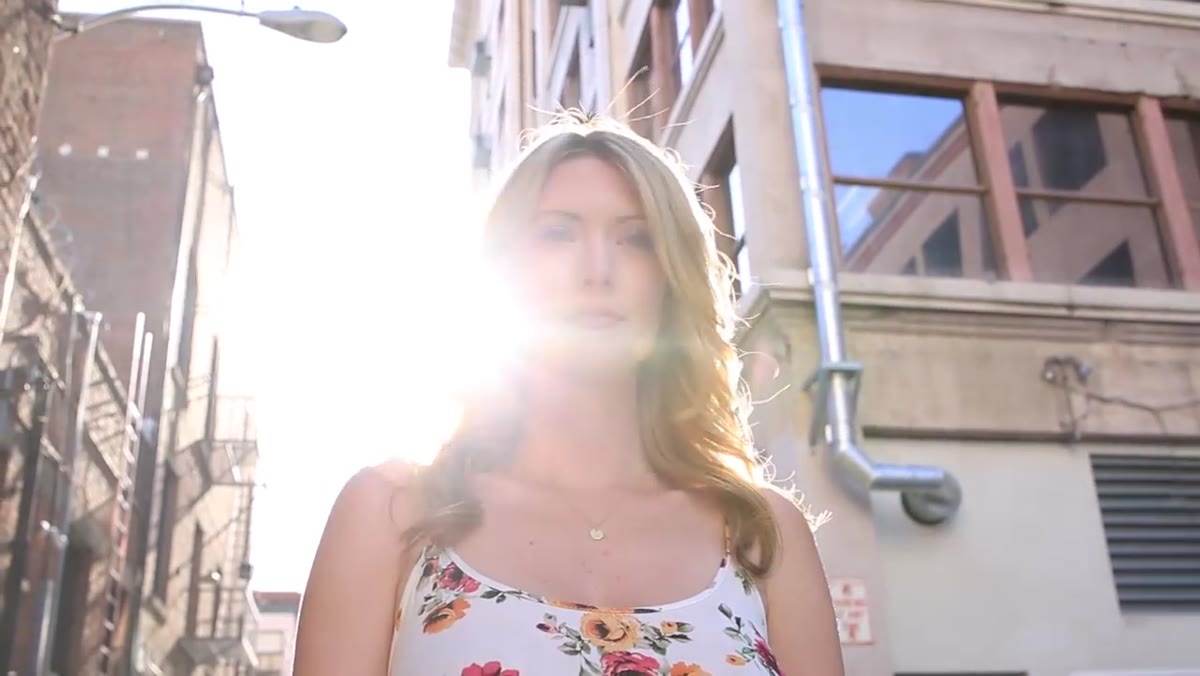 Subject positioned with sun directly behind her head
