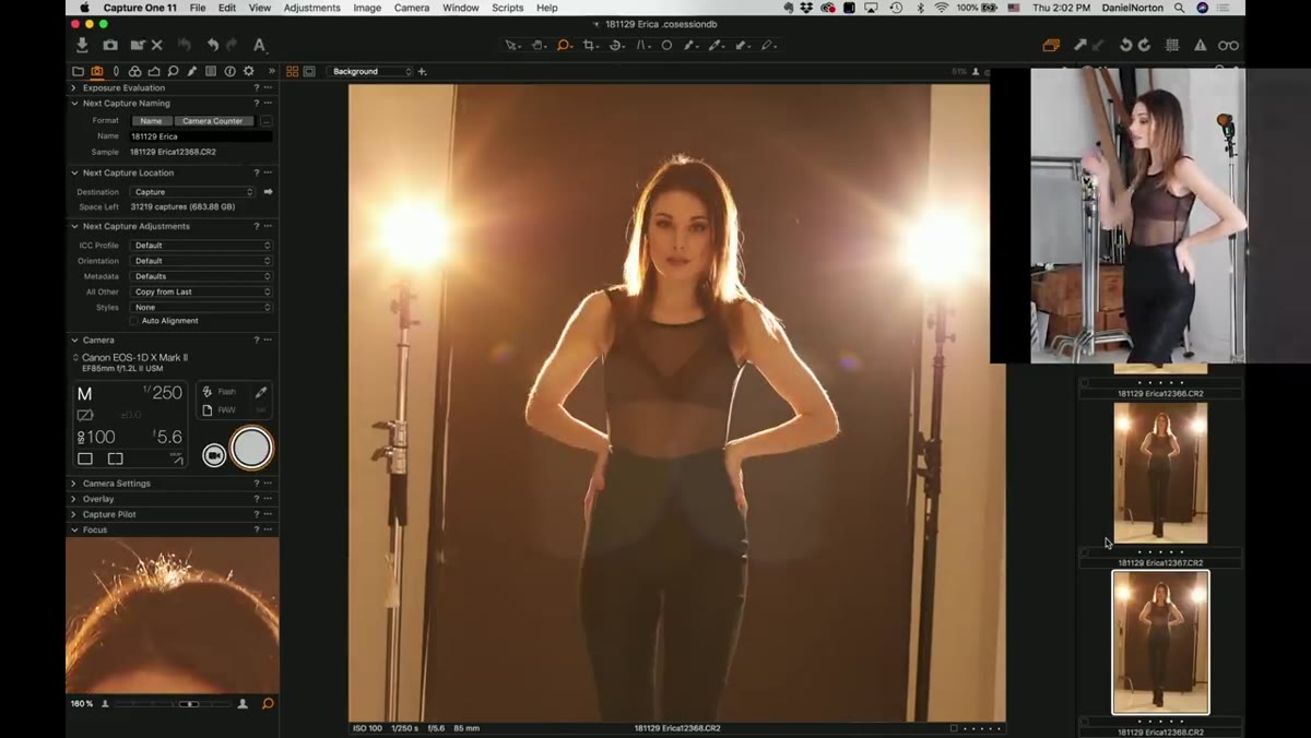 Full-length frame showing strobes visible in shot, flare across image