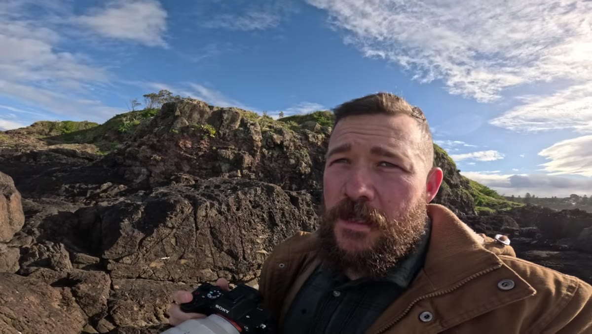 Photographer zoomed in tight on breaking wave at the coast