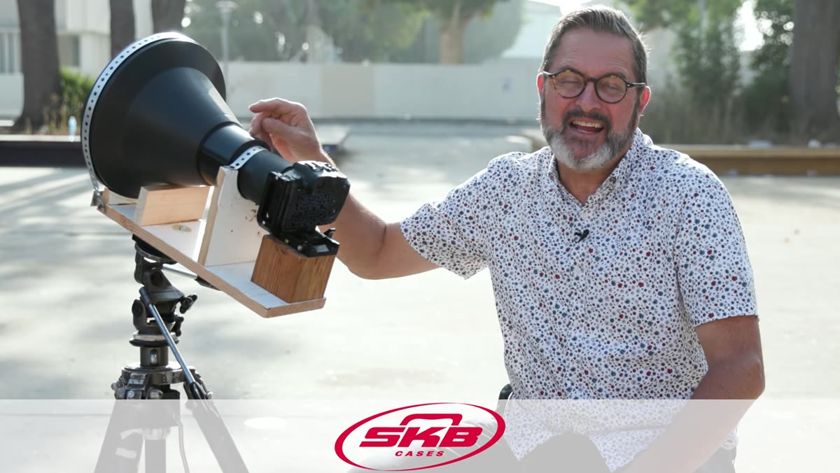 JP holds the massive iWerks IMAX lens at the skate park