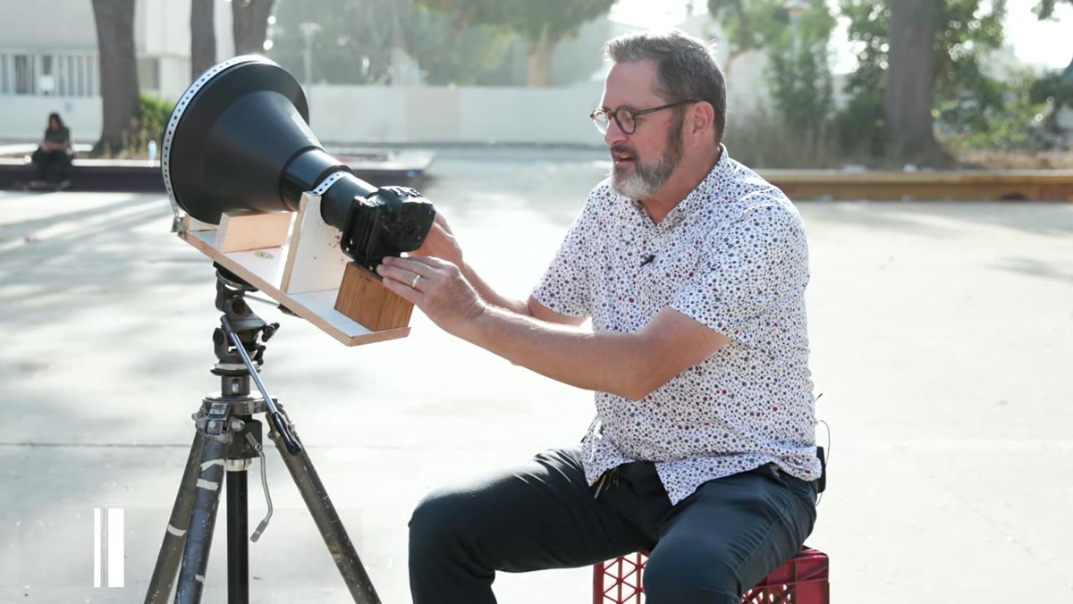 JP slides the camera body back and forth within the tape mount to find focus