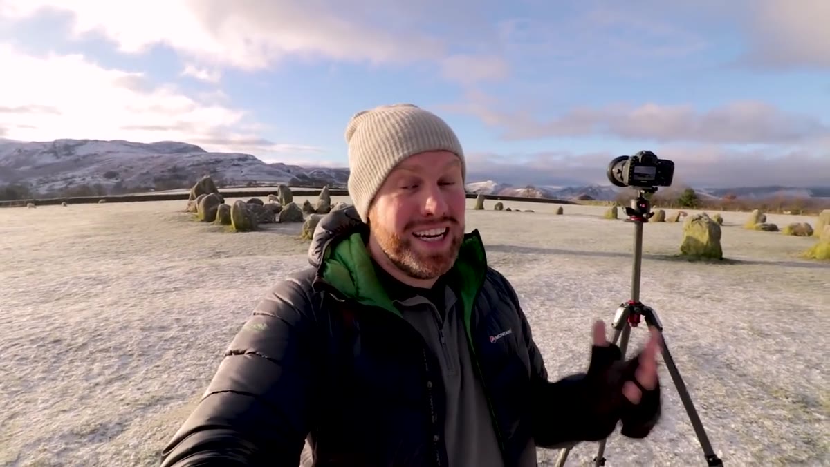 Stone circle with tripod raised to maximum height for elevated perspective