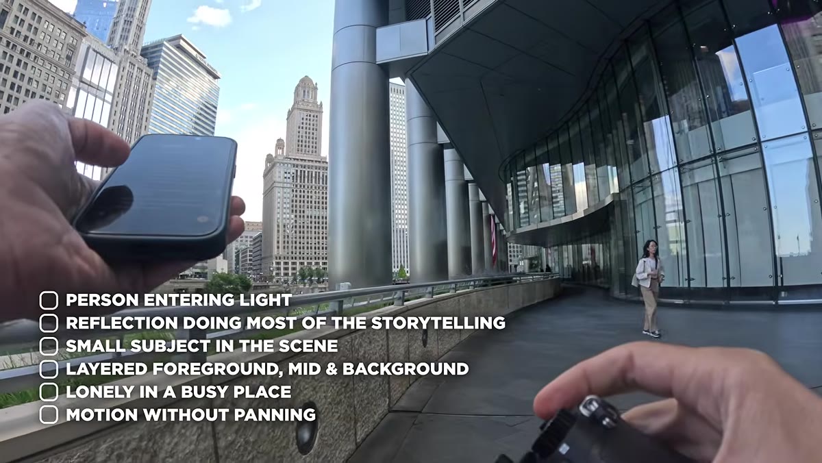 Pierre on Chicago street scanning for small figure in large scene