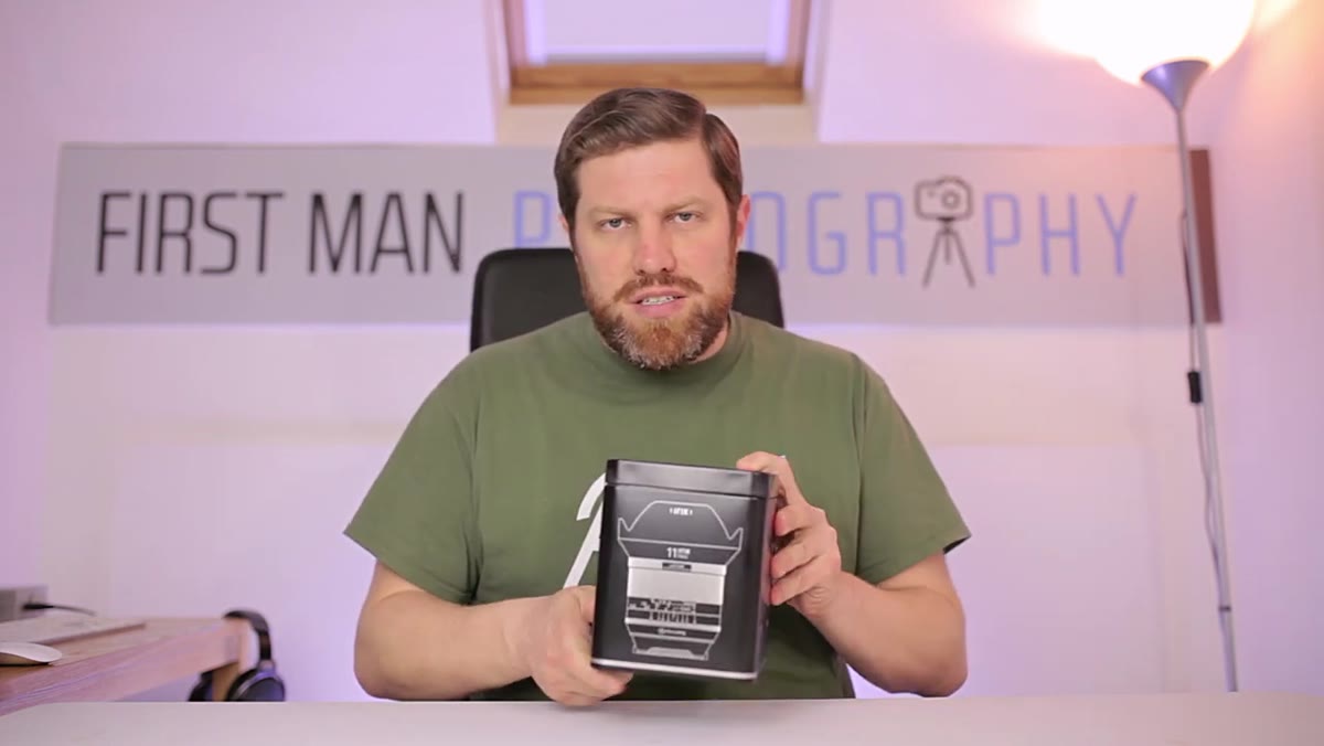 Reviewer opening the metal box and neoprene pouch