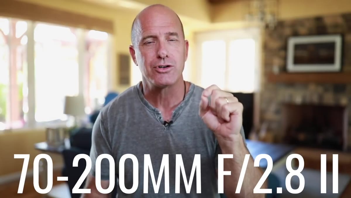 Joel holding the Canon 70-200 2.8 lens