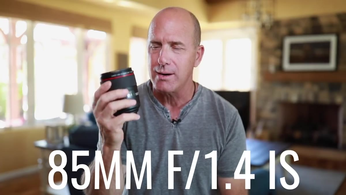 Joel holding the Canon 85mm f/1.4 IS lens