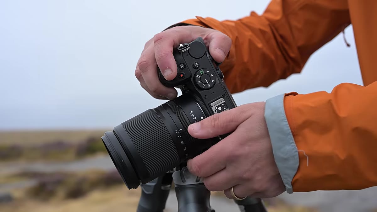 Camera body shown without viewfinder hump, screen visible