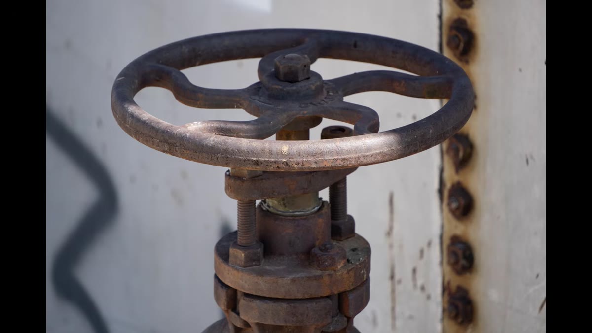 Extreme close-up of tank hardware at near-minimum focus