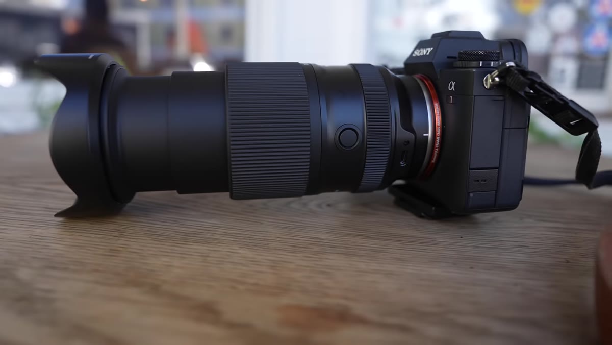First impression of the lens against Tony&rsquo;s hand for scale