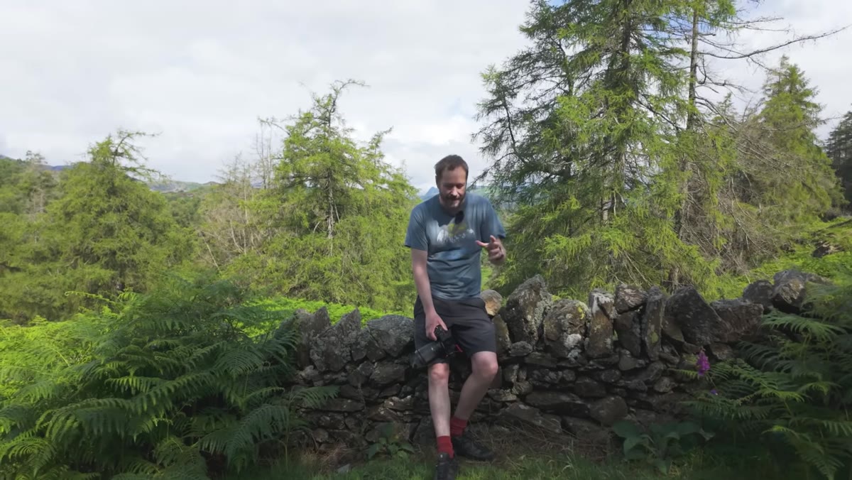 Danson discussing prime lens philosophy while walking