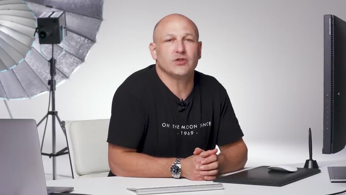 Narrator explaining what a camera lens is