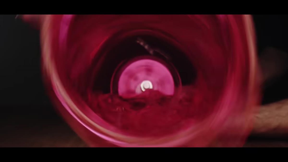 Rapid-cut sequence of probe lens shots synced to music
