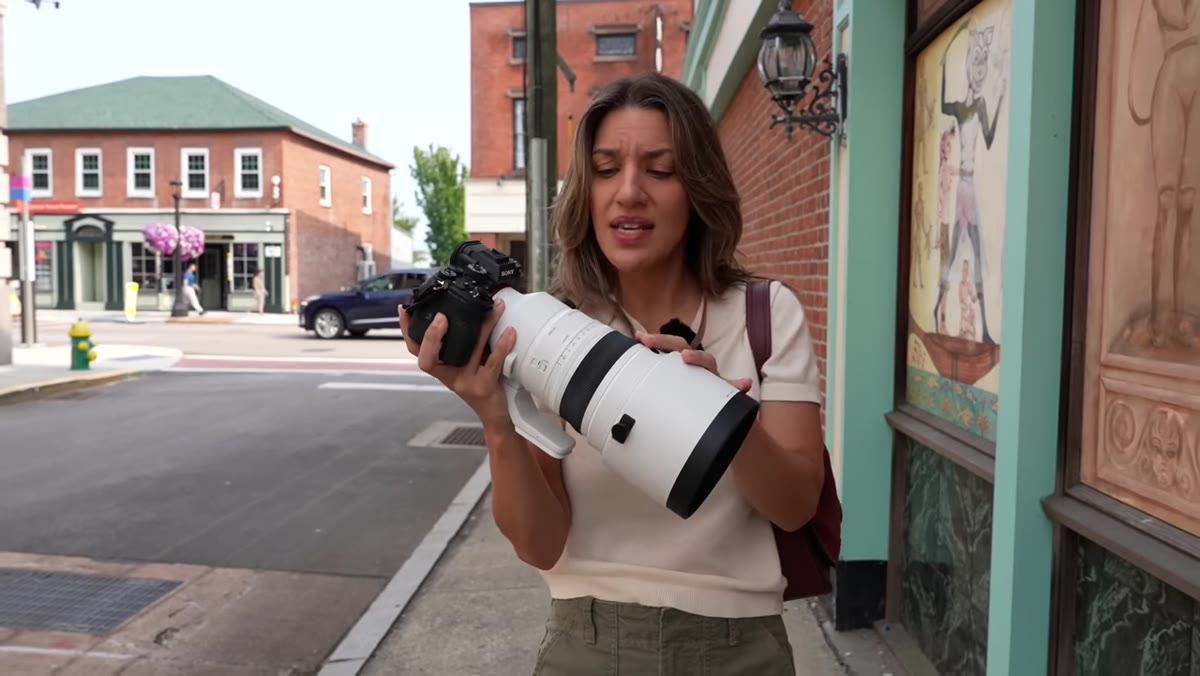 Chelsea holding the Sigma 200mm f2 lens out of box