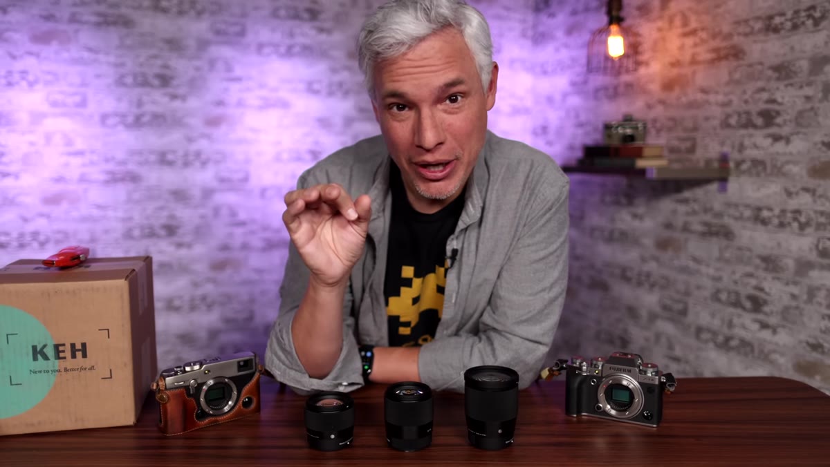 Sigma and Fuji lenses side by side on a table