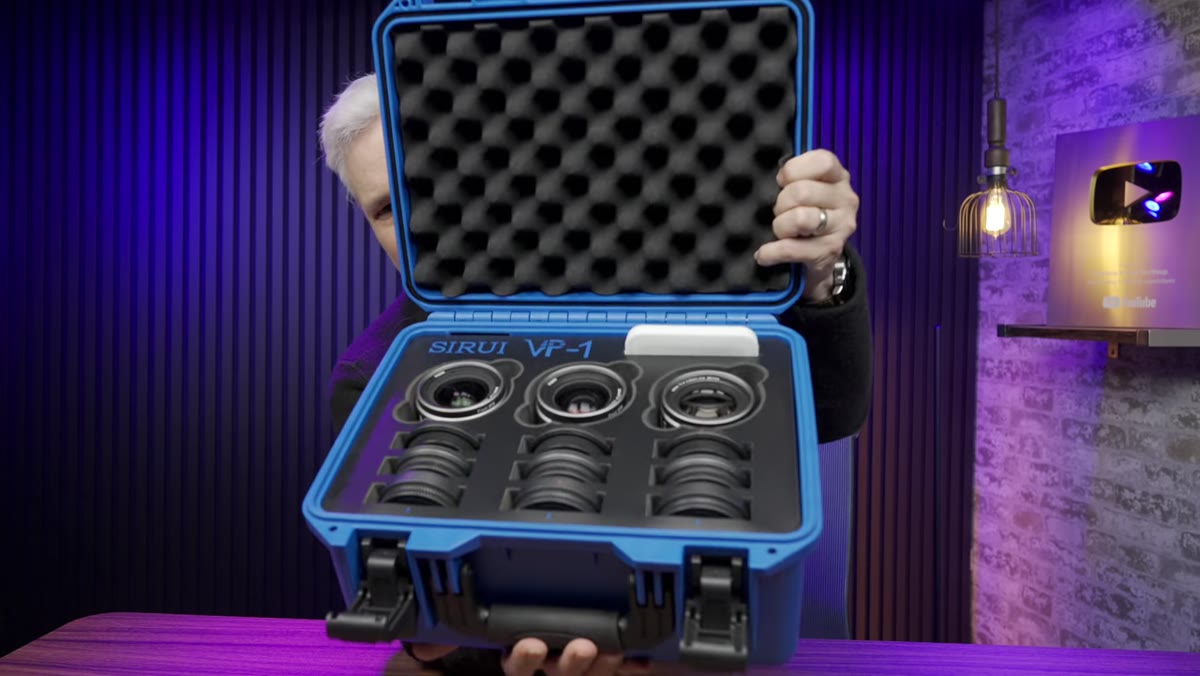 Three Sirui VP-1 lenses displayed together on a surface