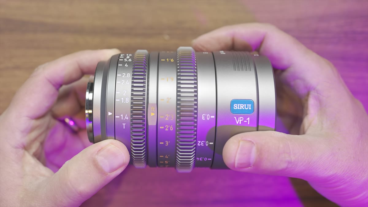 Close-up of focus and aperture gear rings on the lens body