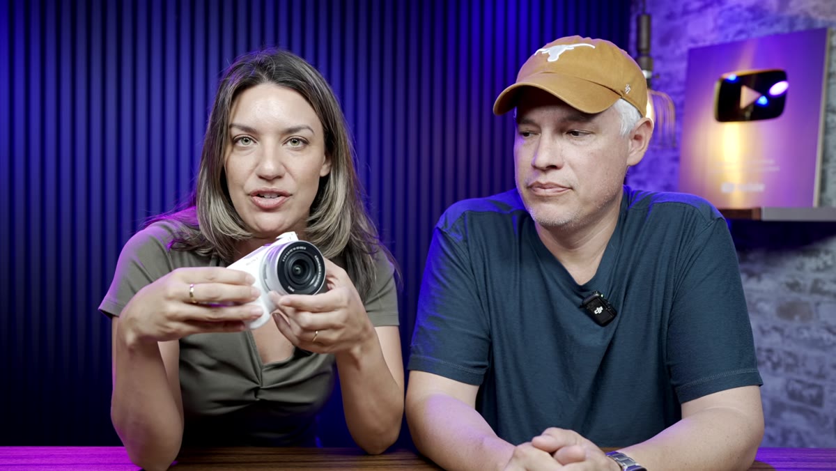 Host explaining APS-C sensor size and interchangeable lens system