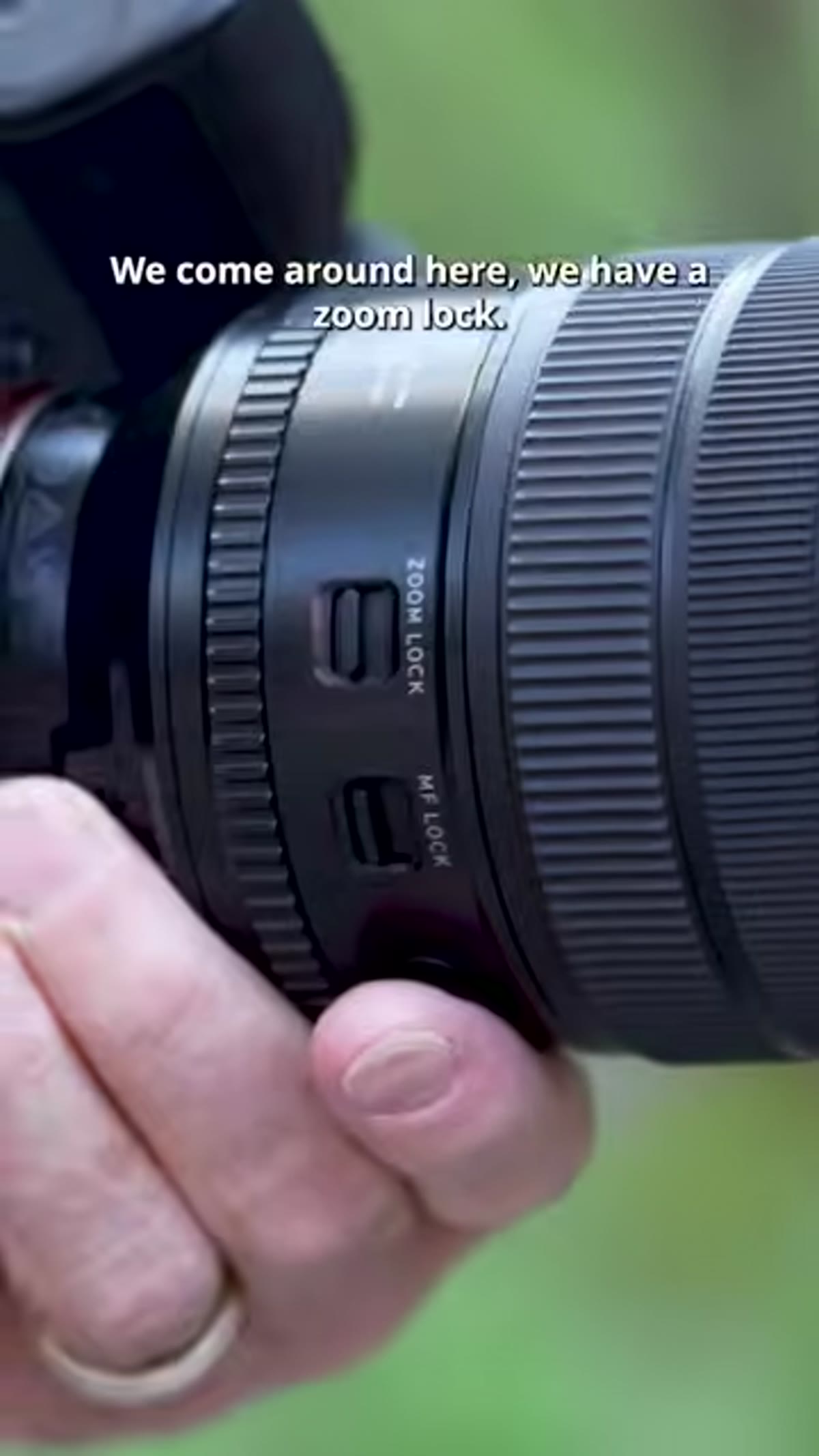 Zoom lock switch on lens barrel at 12mm or 20mm position