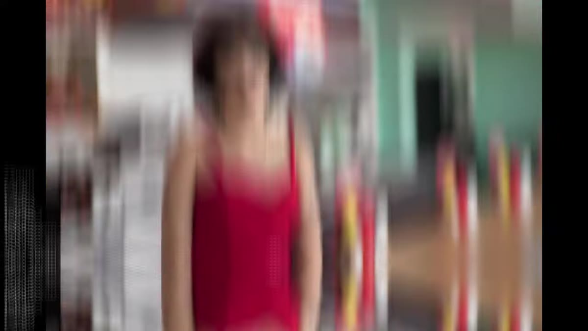 Wide aperture background blur with soft round bokeh visible