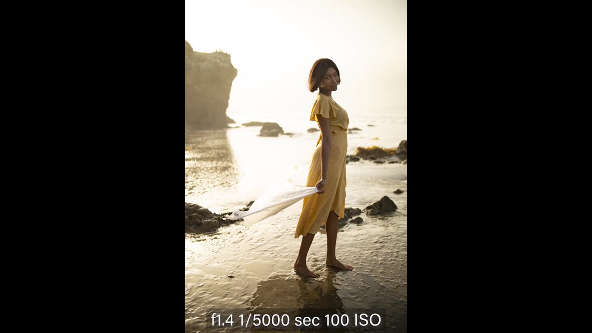 Backlit portrait showing lens flare and chromatic aberration control