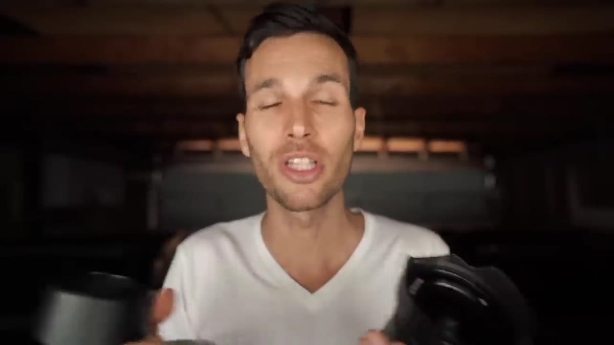 Pierre describing camera drop incident, gesturing toward lens front