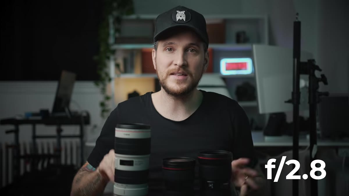 McKinnon referencing the 2.8 aperture as a shared spec across the trinity