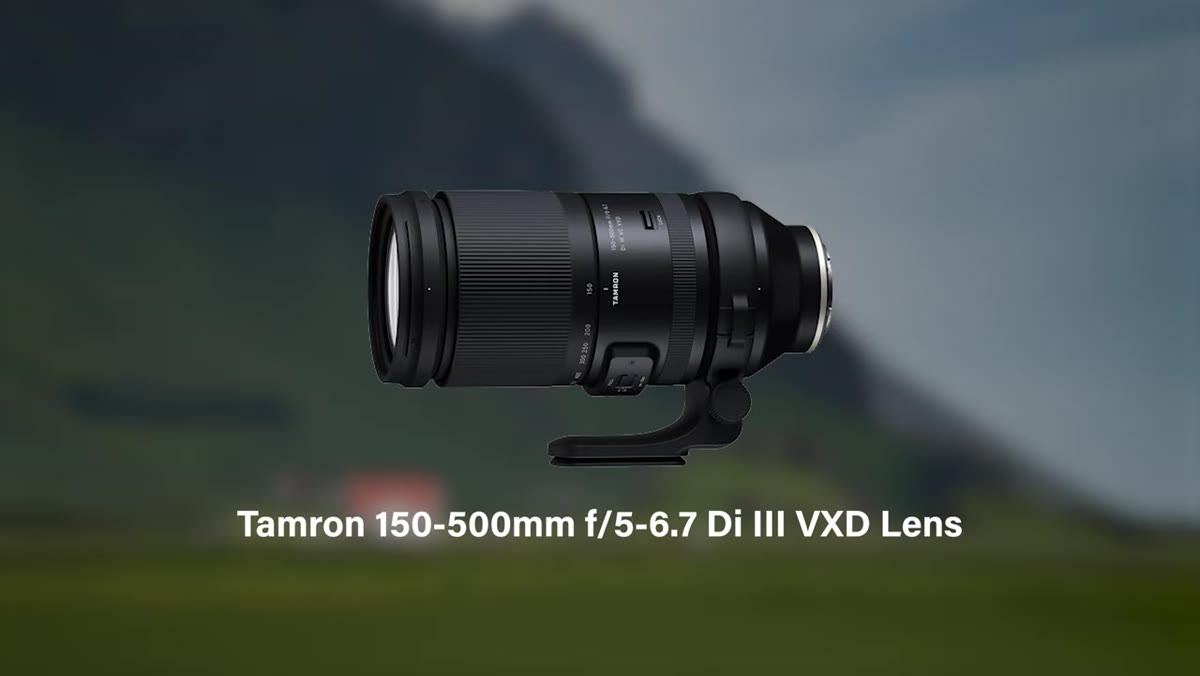 Jay holding the 150-500mm lens outdoors in Iceland