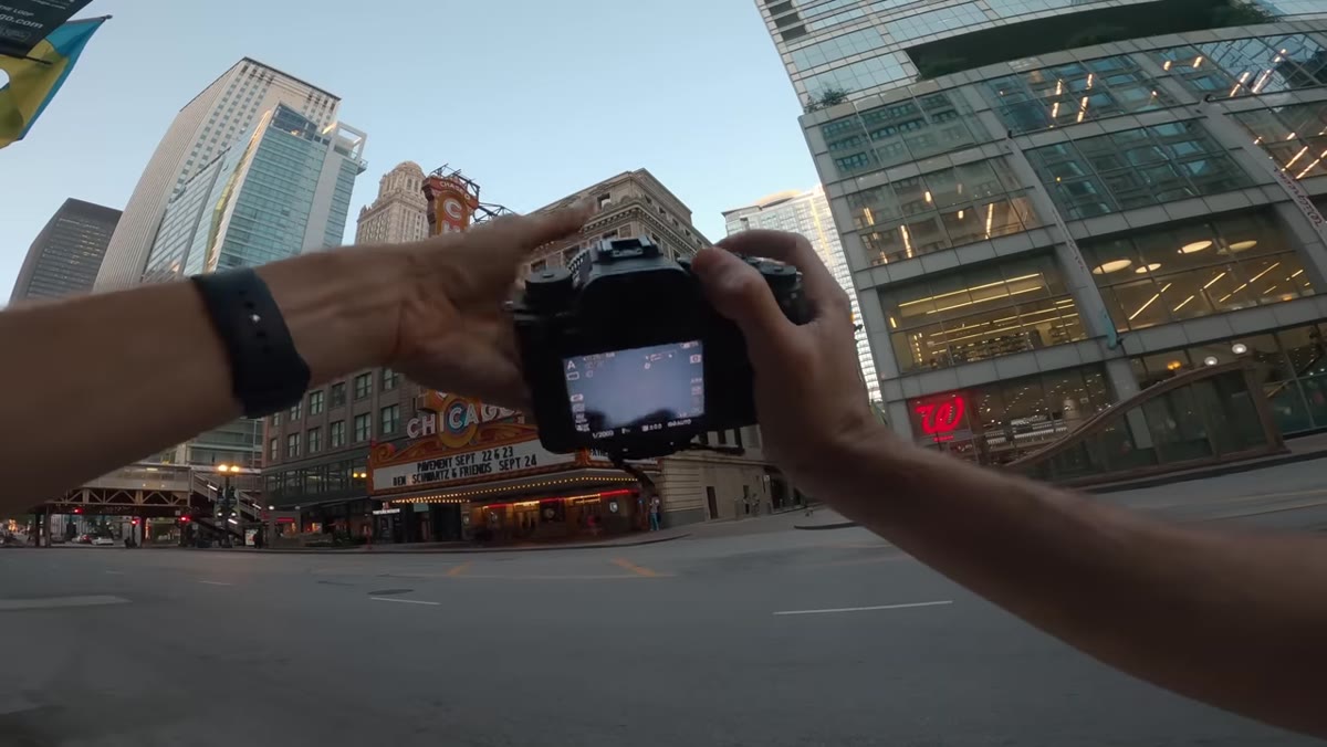 Hands demonstrating the tilt lens rotation and shift axes