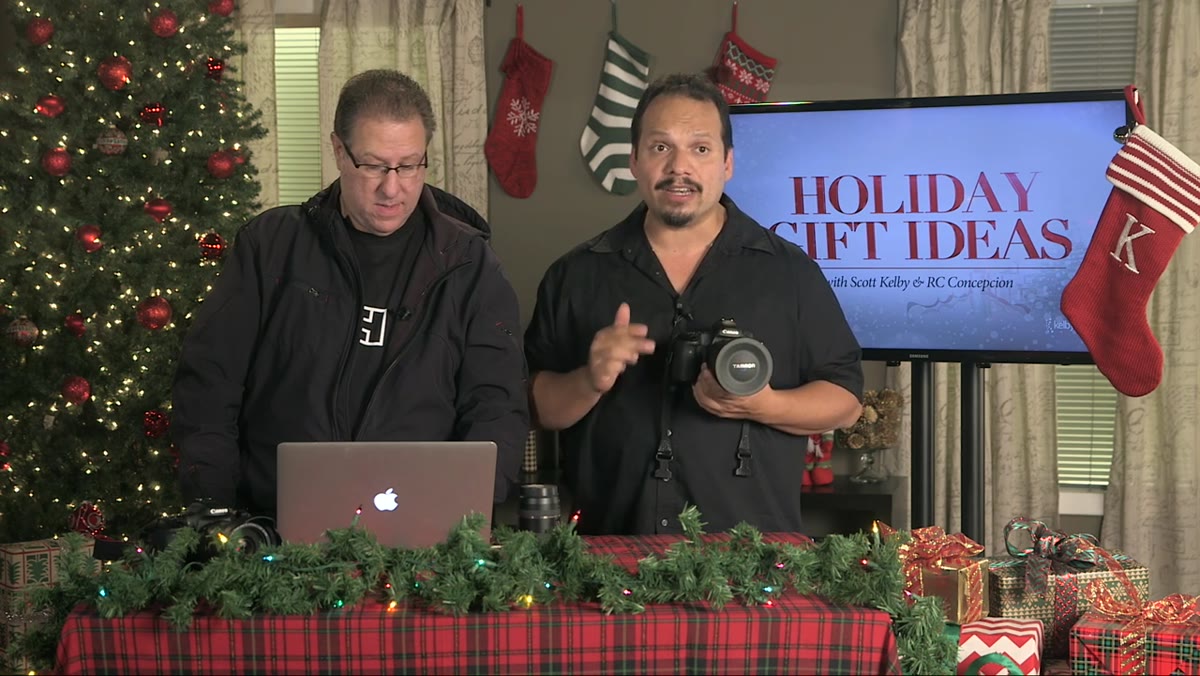 RC holding the Tamron 15-30mm lens up to camera
