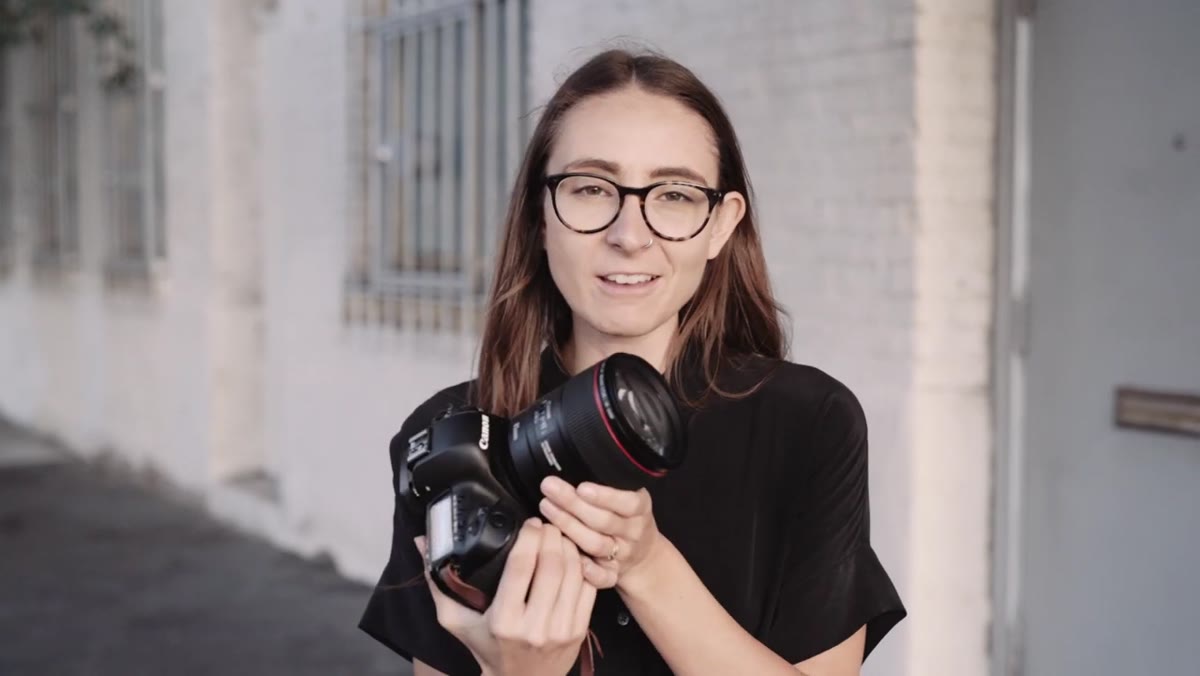 85mm portrait with blurred urban background showing compression