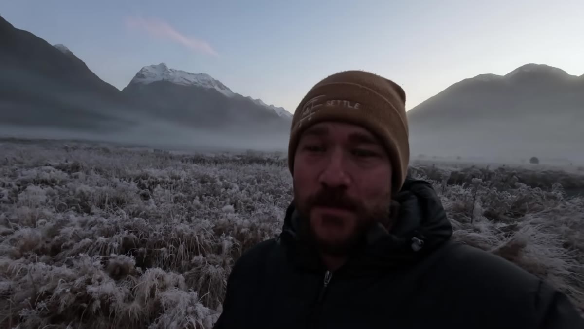 William walking through a frosted landscape at dawn