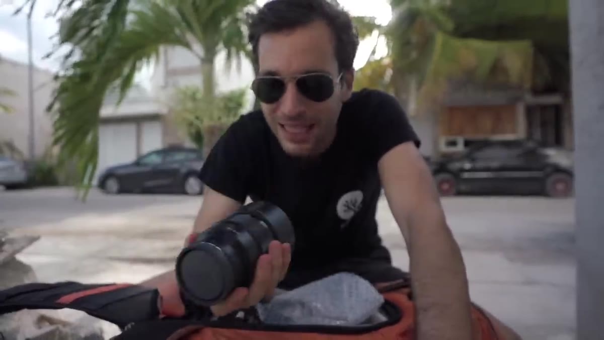 Pierre revealing the Sony 85mm f/1.8 and comparing its size